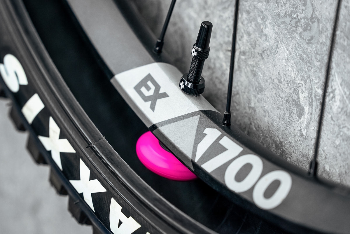 Muc-Off-Stealth-Tubeless-Valvestem-Apple-AirTag-Holder-4.jpg